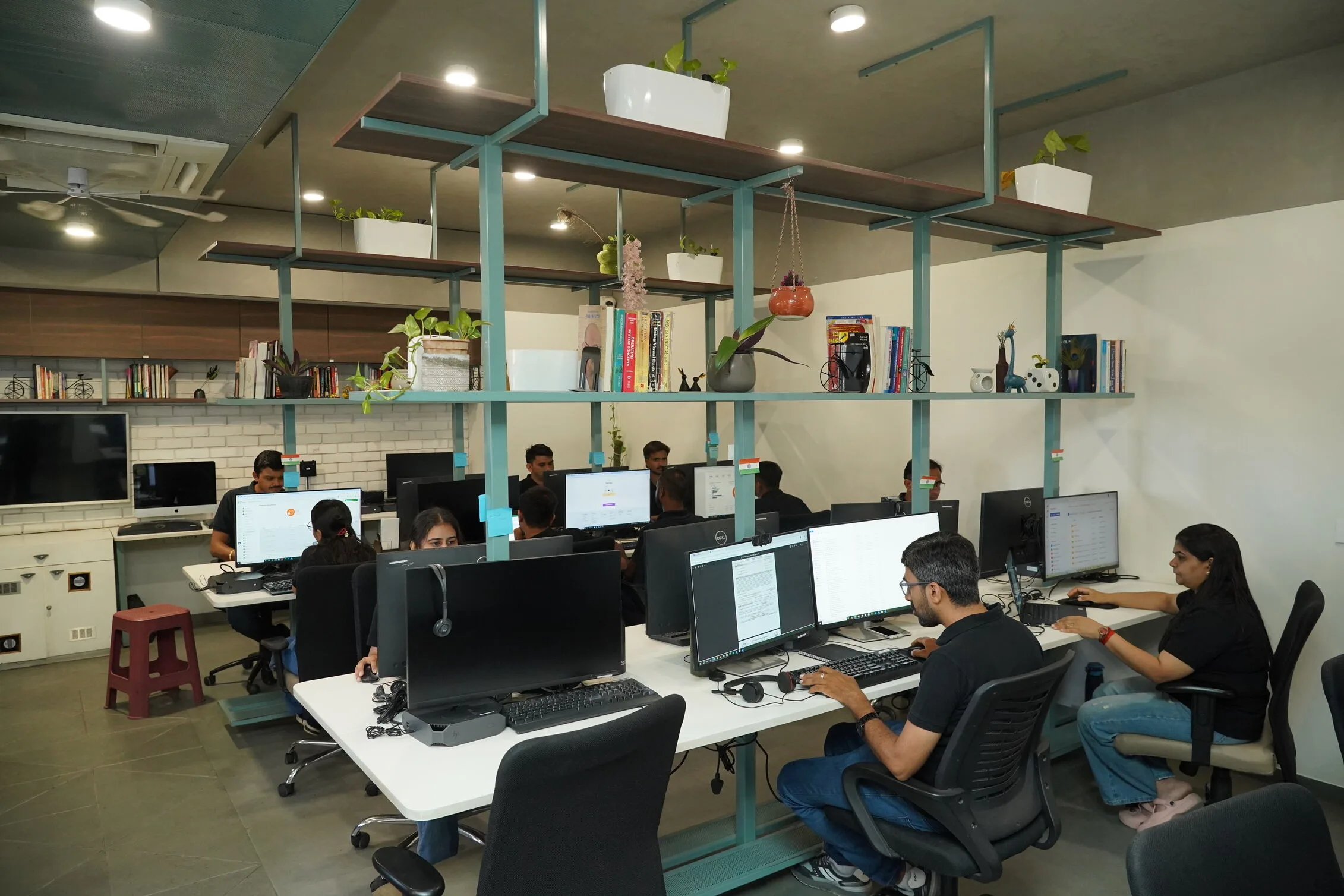 Datastub employees working in the company's office workspace