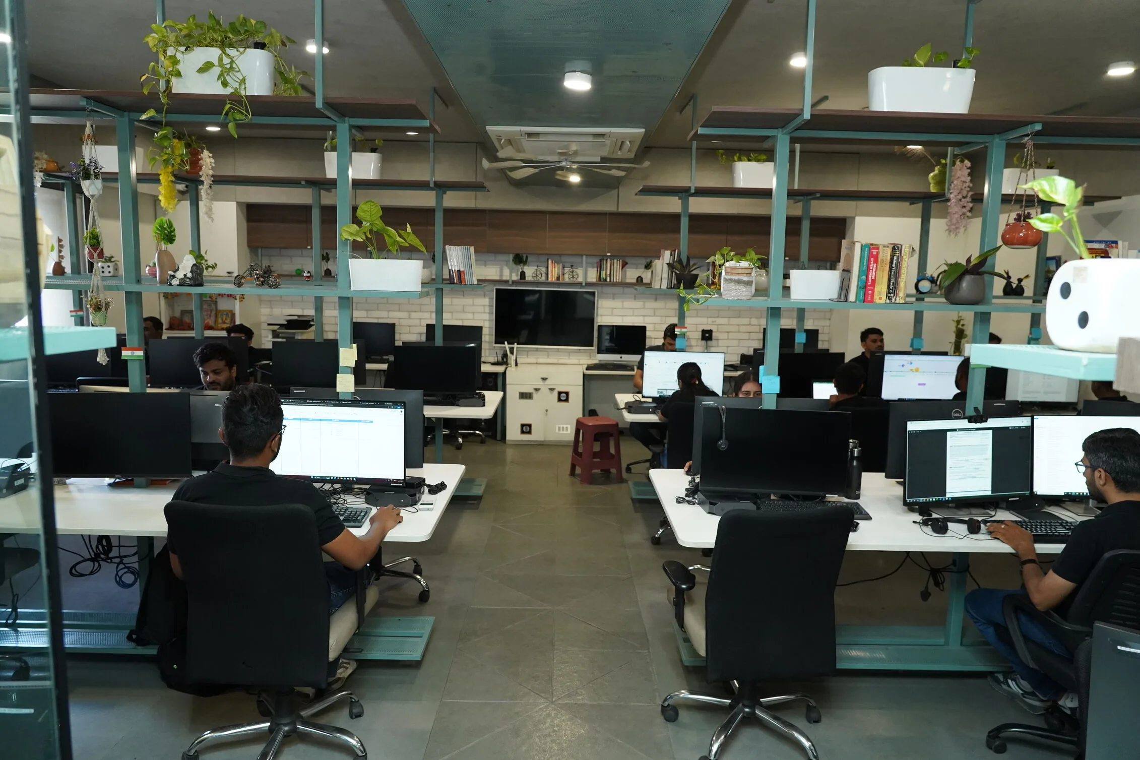 Datastub employees working in the company's office workspace