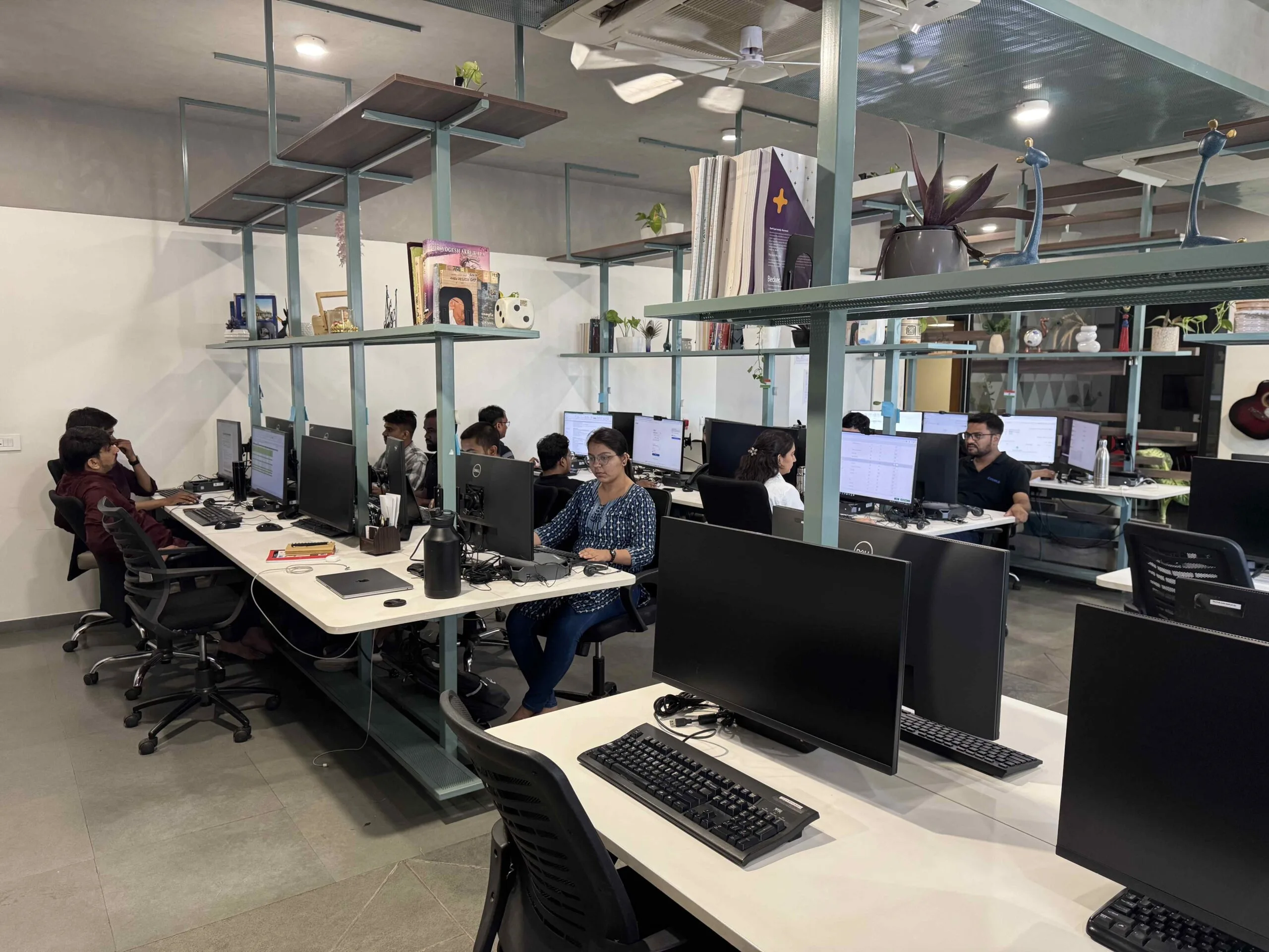 Datastub employees working in the company's office workspace