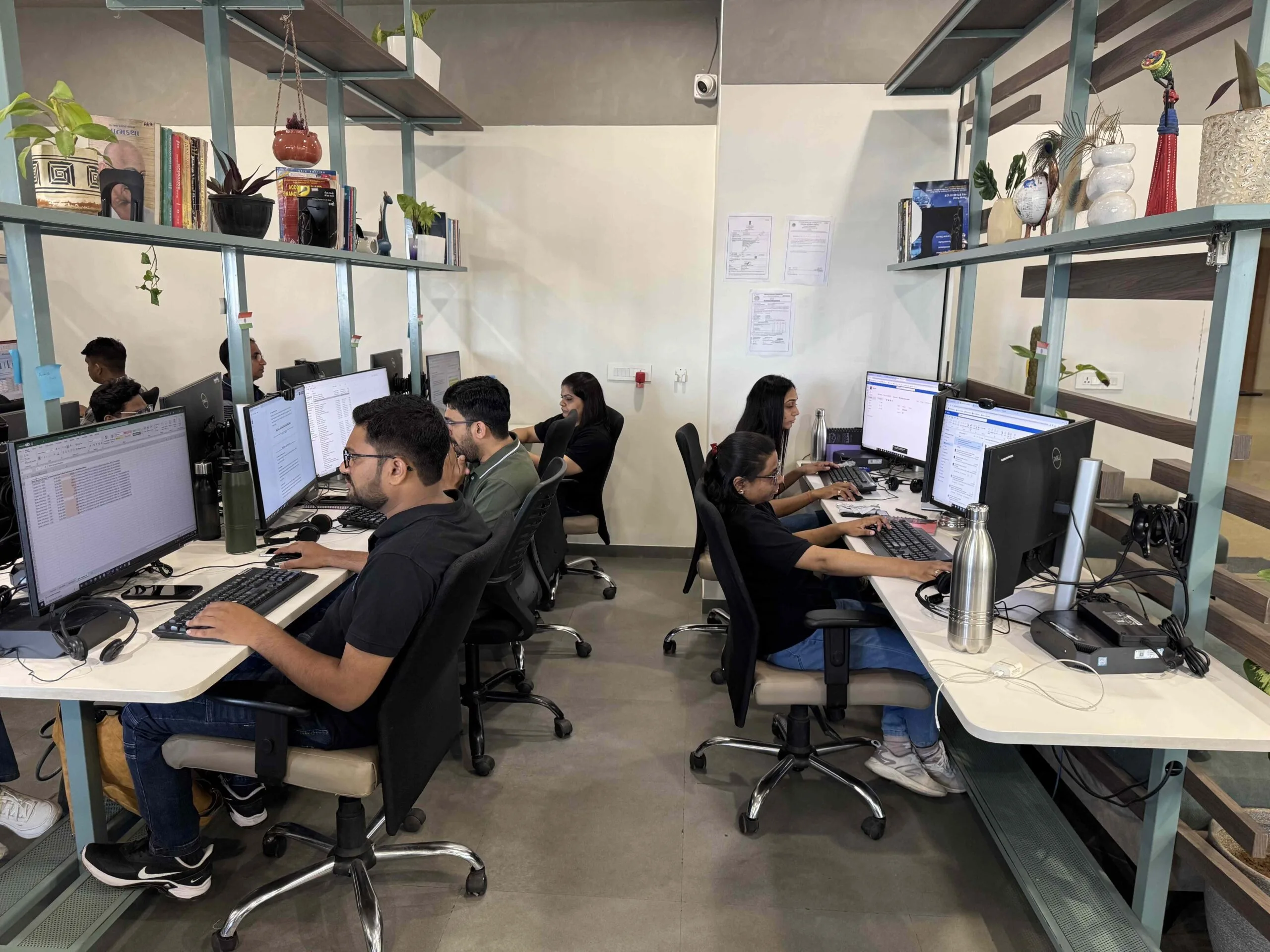 Datastub employees working in the company's office workspace