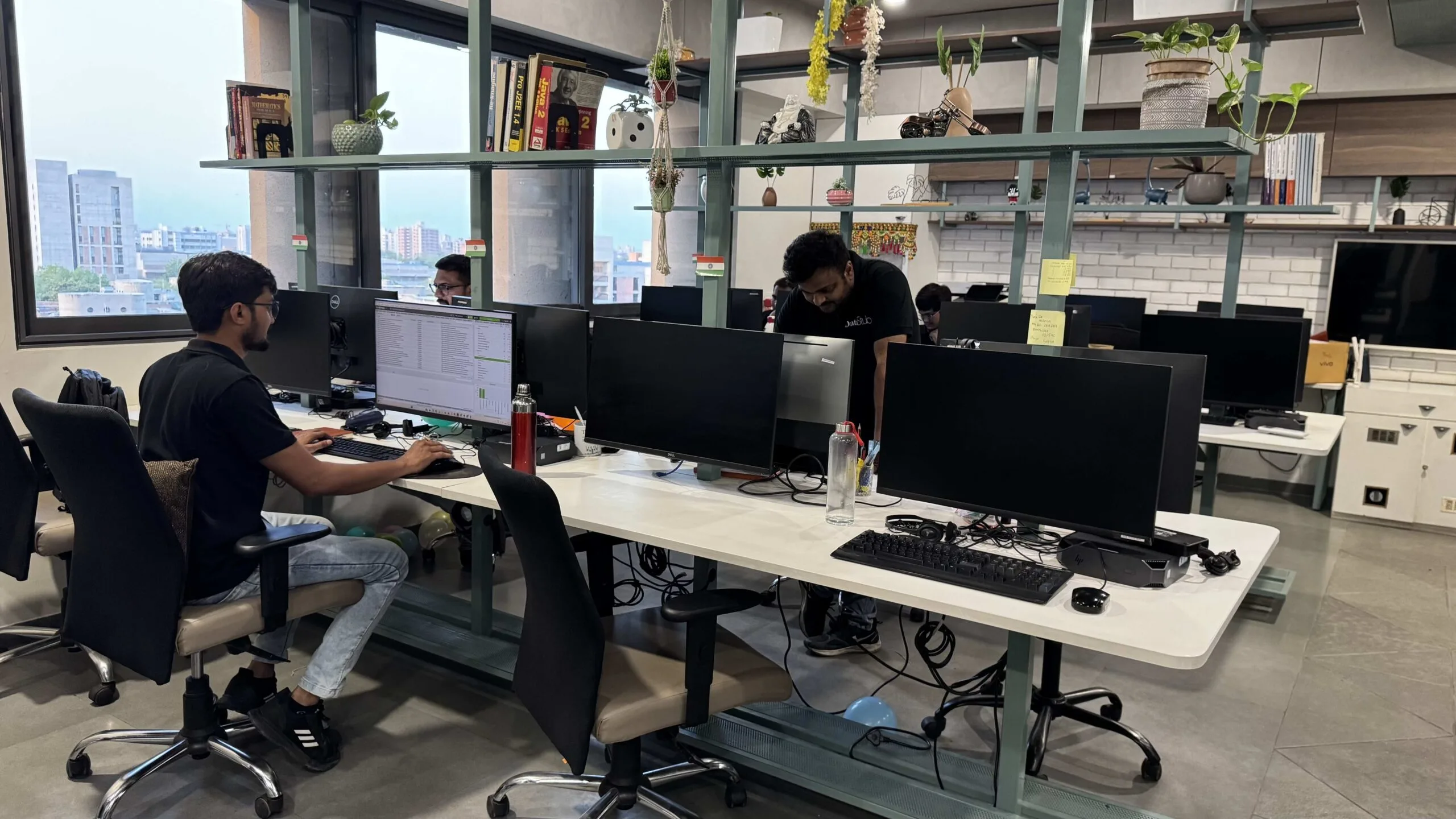 Datastub employees working in the company's office workspace